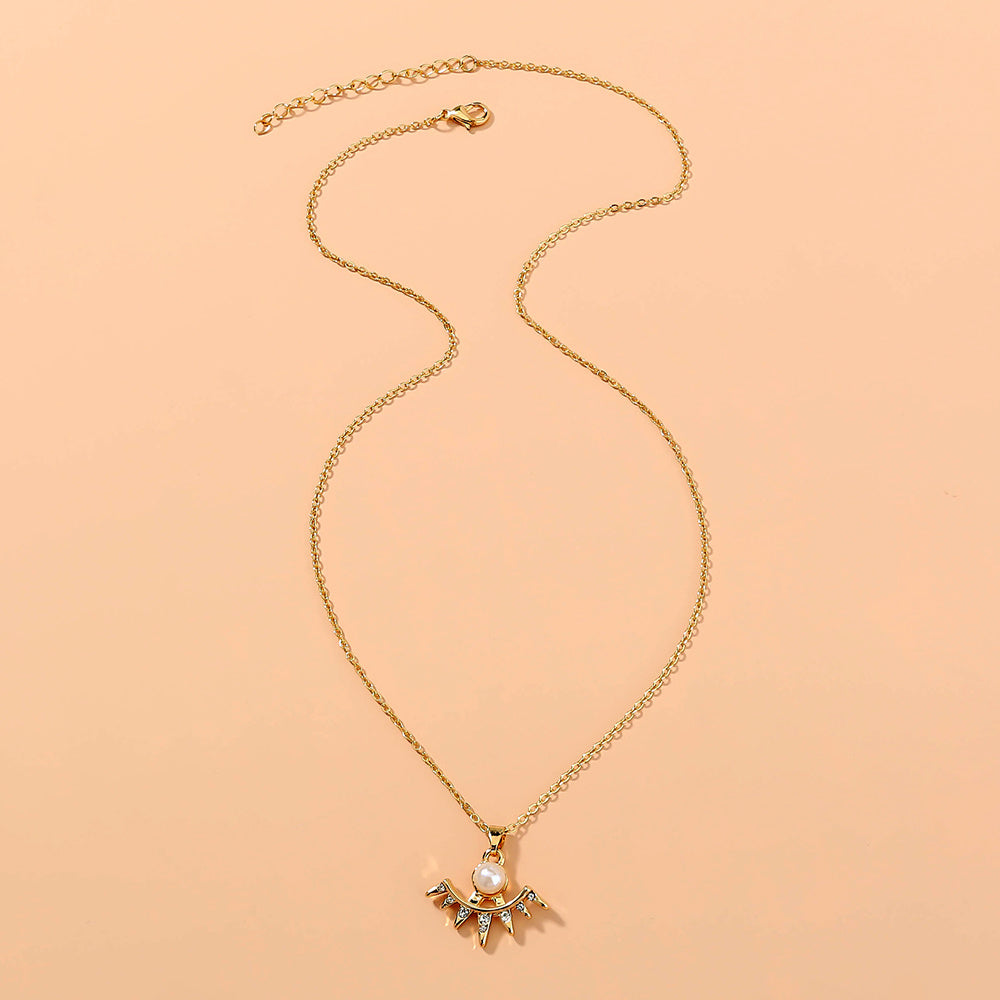 Diamond-studded scalloped necklace